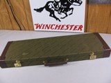 8085
Winchester 101 Shotgun, Green Trunk style hard case, Has two blocks, Comes with Winchester shotgun paperwork.
