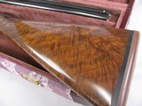 8087
Winchester 23 Grand Canadian 20 GA, 2 3/4 and 3 “. 26” barrels, IC/MOD, 14 1/4 LOP, Winchester pad, AAA+ Fancy Feather Crotch Walnut. Straight G - 3 of 23