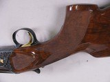 8096
Winchester 101 Presentation Grade, 12 Gauge, 30” Barrels, 14 1/4 LOP,
IM/F, vent rib, 2 white beads, AAA++ Fancy Walnut feather crotch, Winches - 13 of 15