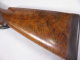 8107
Winchester Model 21 12 Gauge wood stock, woods length is 14 1/2”, with the leather pad the length is 15”, pistol grip, nice figured wood. - 2 of 11