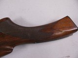 8107
Winchester Model 21 12 Gauge wood stock, woods length is 14 1/2”, with the leather pad the length is 15”, pistol grip, nice figured wood. - 11 of 11