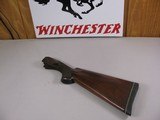 8108
Winchester 101 12 Gauge wood stock, the length of the wood is 15 3/4” and the length with the pad is 16 1/2”,
pistol grip, has handling marks