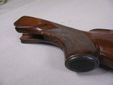 8110
Winchester 101 12 gauge stock, the wood measures 14 1/2, with the pad it measures 15 3/4, pistol grip. - 6 of 12