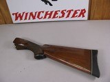 8110
Winchester 101 12 gauge stock, the wood measures 14 1/2, with the pad it measures 15 3/4, pistol grip.