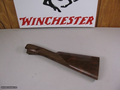 8115
Winchester 101 Pigeon 28 gauge stock, wood length measures 14 1/2, no pad/plate. Nice dark wood clean, has a scratch see pictures