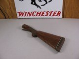 8111
Winchester 101 20 Gauge stock, the wood measures 14 1/2
and with the pad it measures 15 1/4.
Round knob, nice clean wood