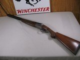 8124
Winchester 23 Pigeon XTR, 12 gauge, 26” Barrels, Winchoke screw in chokes, MOD/FULL, Beavertail, ejectors, Rose and scroll engraving, Winchester