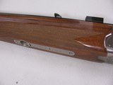 8123
Winchester Super grade 12 gauge over 222 Remington. Only 1000 ever produced, This is number 830. Has bases for scope, Cheak piece, Rose and scro - 7 of 16