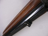 8123
Winchester Super grade 12 gauge over 222 Remington. Only 1000 ever produced, This is number 830. Has bases for scope, Cheak piece, Rose and scro - 14 of 16