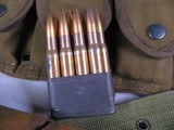 8132
30-06 Ammunition 80 rounds, Loaded in Garand clips. With Army belt. - 3 of 10