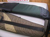 8755Gun cases, Rifle or shotgun- soft sided. 47” on the Allen and 52” on the Thompson case. - 2 of 7