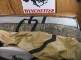 8757
Shotgun and rifle cases. Real tree case 52” long, Winchester case 49” and the leather case 50”. Gun case cover …All are in good used condition.