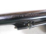 8789 Smith and Wesson 32/20, Letters with Smith and Wesson- Letter included,
Hand Ejector model 1905 4th variation, 5” Barrel, blue finish and check - 12 of 19