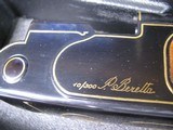 8796 Beretta Black & Gold Tercentennial Model, 12 gauge, 28 inch barrel, M/F chokes, gold trigger, 14 1/4 LOP.
#10 of 300, exquisite high luster blac - 9 of 25