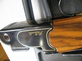 8796 Beretta Black & Gold Tercentennial Model, 12 gauge, 28 inch barrel, M/F chokes, gold trigger, 14 1/4 LOP.
#10 of 300, exquisite high luster blac - 14 of 25