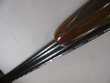 8797
Winchester 101 XTR, Lightweight 20 Gauge, 28” Barrels, M/F, 3” Chambers, Quail, pheasants, and woodcock engraved, on coin receiver, Winchester b - 14 of 14