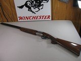 8797
Winchester 101 XTR, Lightweight 20 Gauge, 28” Barrels, M/F, 3” Chambers, Quail, pheasants, and woodcock engraved, on coin receiver, Winchester b