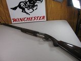 8802
Winchester 101 Pigeon Grade, 20 Gauge, 28” barrels, Round knob, vent rib, beautiful dark wood, 14 1/4 LOP, Silver coin engraved receiver, 2 3/4