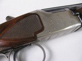 8802
Winchester 101 Pigeon Grade, 20 Gauge, 28” barrels, Round knob, vent rib, beautiful dark wood, 14 1/4 LOP, Silver coin engraved receiver, 2 3/4 - 14 of 15