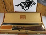 8803
Winchester 23 Golden Quail 20 Gauge, 2 3/4 and 3” Chambers, 14 1/4 LOP, 26” Barrels, IC/M, Winchester Pad, Feather crotch fancy walnut, Ejectors - 1 of 21