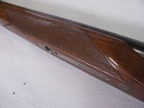 8804Winchester 23 Pigeon XTR, 12 Gauge, 26” Barrels, IC/Mod, vent rib, ejectors, rose and scroll engraved, coin finish, 14” LOP, Winchester butt pla - 8 of 16