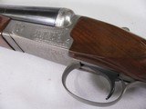 8804Winchester 23 Pigeon XTR, 12 Gauge, 26” Barrels, IC/Mod, vent rib, ejectors, rose and scroll engraved, coin finish, 14” LOP, Winchester butt pla - 6 of 16