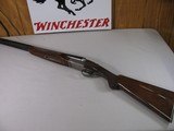 8804Winchester 23 Pigeon XTR, 12 Gauge, 26” Barrels, IC/Mod, vent rib, ejectors, rose and scroll engraved, coin finish, 14” LOP, Winchester butt pla - 2 of 16