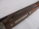 8804Winchester 23 Pigeon XTR, 12 Gauge, 26” Barrels, IC/Mod, vent rib, ejectors, rose and scroll engraved, coin finish, 14” LOP, Winchester butt pla - 13 of 16
