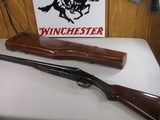 8809
Winchester Model 21 12 Gauge, 26” reblued barrel, SK/SK, After Market engraved receiver, splinter forend, double trigger, ejectors, 2 white bead - 1 of 16