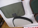 8815
5 pistol soft cases, 2 Allen green 14” Pistol cases, Brown Leather Pistol case 11”, Gray pistol case 12”, Green Pad case 11” All are good used c - 3 of 7