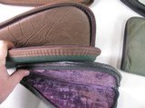 8815
5 pistol soft cases, 2 Allen green 14” Pistol cases, Brown Leather Pistol case 11”, Gray pistol case 12”, Green Pad case 11” All are good used c - 5 of 7