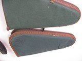 8815
5 pistol soft cases, 2 Allen green 14” Pistol cases, Brown Leather Pistol case 11”, Gray pistol case 12”, Green Pad case 11” All are good used c - 2 of 7