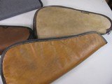 8816
4 Pistol soft cases, Kolpin 14 1/2”, Allen 14”, Brown leather Pistol case 16 1/2”, Moose pistol case 15”. All are good used condition. - 3 of 5