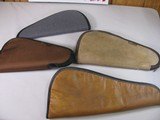 8816
4 Pistol soft cases, Kolpin 14 1/2”, Allen 14”, Brown leather Pistol case 16 1/2”, Moose pistol case 15”. All are good used condition. - 1 of 5