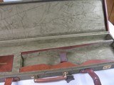 8831
Winchester Grand European Shotgun case. These are very rare to come by. This case will fit up to a 32” Barrel. It has the original hang , keys a - 11 of 12