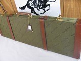 8831
Winchester Grand European Shotgun case. These are very rare to come by. This case will fit up to a 32” Barrel. It has the original hang , keys a - 6 of 12