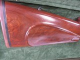 8848 Winchester 101 “Boar” 12 Gauge (3”) over 7x57 Mauser, 25” barrel, LOP with custom high comb is 13 3/4. LOP with original correct serialized stock - 19 of 25