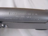 8859  Sporting Arms Snake Charmer II, 410 Stainless Steel, Black Composite thumb grip stock, 18” Barrel,  This snake charmer is like new in its origin - 6 of 16