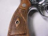 8861 Smith and Wesson Model 36, 38 Special, 2” Barrel, Nickel Finish, wood Grips, Minor marks on the cylinder what looks like from sitting in a gun ba - 10 of 11