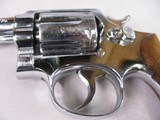 8861 Smith and Wesson Model 36, 38 Special, 2” Barrel, Nickel Finish, wood Grips, Minor marks on the cylinder what looks like from sitting in a gun ba - 6 of 11