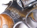 8861 Smith and Wesson Model 36, 38 Special, 2” Barrel, Nickel Finish, wood Grips, Minor marks on the cylinder what looks like from sitting in a gun ba - 9 of 11
