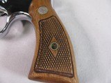 8861 Smith and Wesson Model 36, 38 Special, 2” Barrel, Nickel Finish, wood Grips, Minor marks on the cylinder what looks like from sitting in a gun ba - 3 of 11