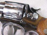 8861 Smith and Wesson Model 36, 38 Special, 2” Barrel, Nickel Finish, wood Grips, Minor marks on the cylinder what looks like from sitting in a gun ba - 4 of 11