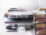 8861 Smith and Wesson Model 36, 38 Special, 2” Barrel, Nickel Finish, wood Grips, Minor marks on the cylinder what looks like from sitting in a gun ba - 5 of 11
