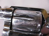8861 Smith and Wesson Model 36, 38 Special, 2” Barrel, Nickel Finish, wood Grips, Minor marks on the cylinder what looks like from sitting in a gun ba - 7 of 11