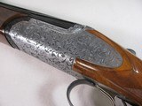 8847
Rizzini Regal EM, 16 Gauge, Screw in Chokes, 5 Chokes included in choke box and wrench, Round Knob, 29” Barrels, Highly Engraved Coin receiver, - 5 of 19