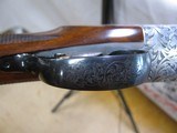 8847
Rizzini Regal EM, 16 Gauge, Screw in Chokes, 5 Chokes included in choke box and wrench, Round Knob, 29” Barrels, Highly Engraved Coin receiver, - 14 of 19