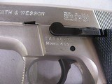 8865
Smith and Wesson Model 469, 9MM, 3.5” barrel, Silver satin nickel, black grips, bore is bright and shiny, original magazine. 98% condition - 4 of 14