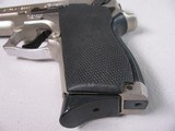 8865
Smith and Wesson Model 469, 9MM, 3.5” barrel, Silver satin nickel, black grips, bore is bright and shiny, original magazine. 98% condition - 7 of 14