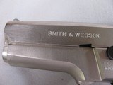 8865
Smith and Wesson Model 469, 9MM, 3.5” barrel, Silver satin nickel, black grips, bore is bright and shiny, original magazine. 98% condition - 3 of 14